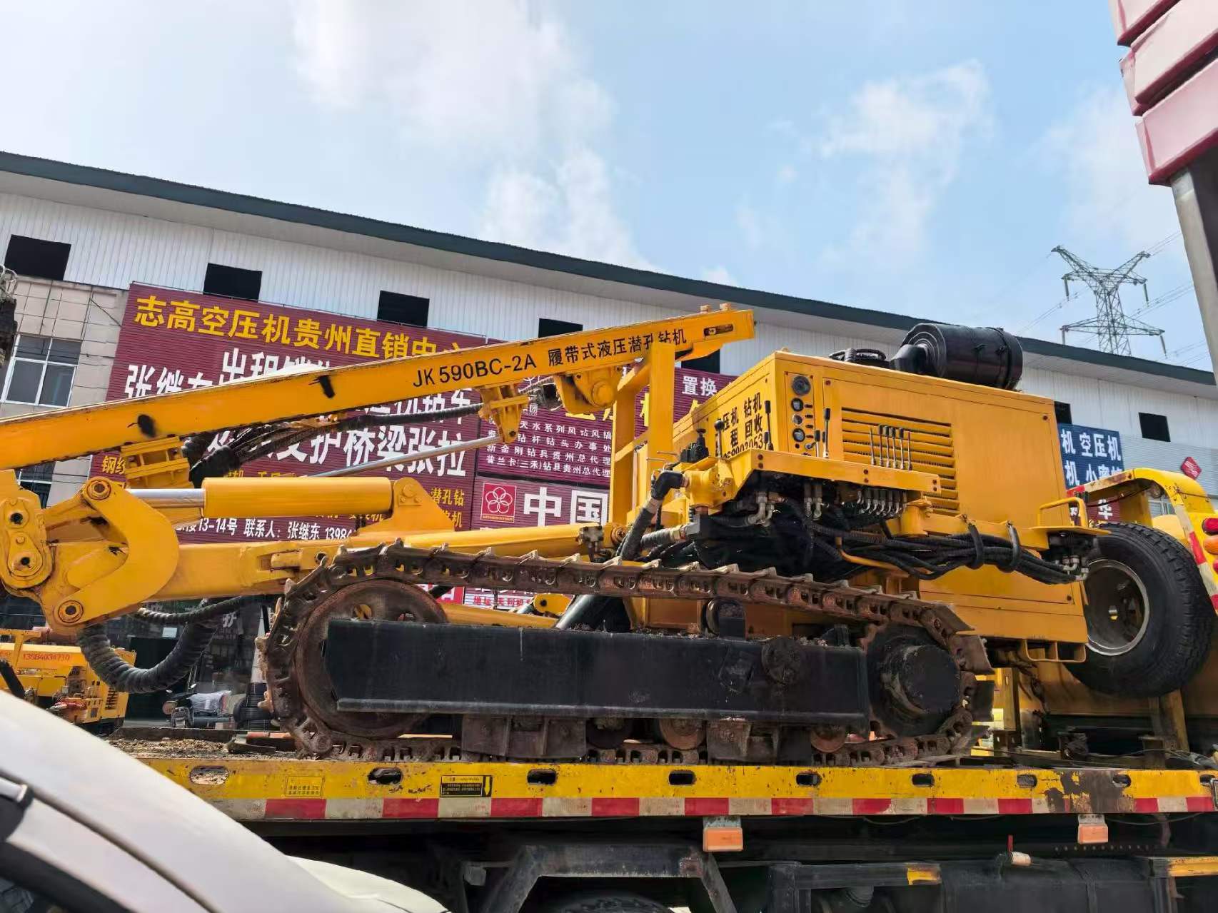 Various DTH drills and air compressors for sale.