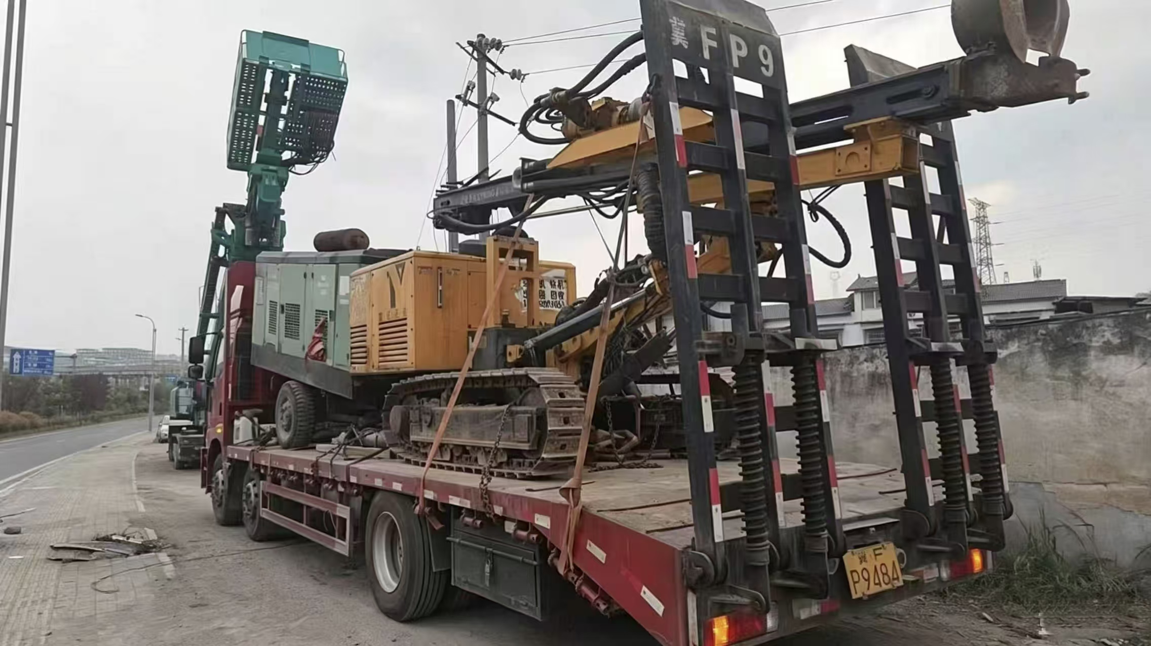 Various air compressors and drilling rigs for sale.