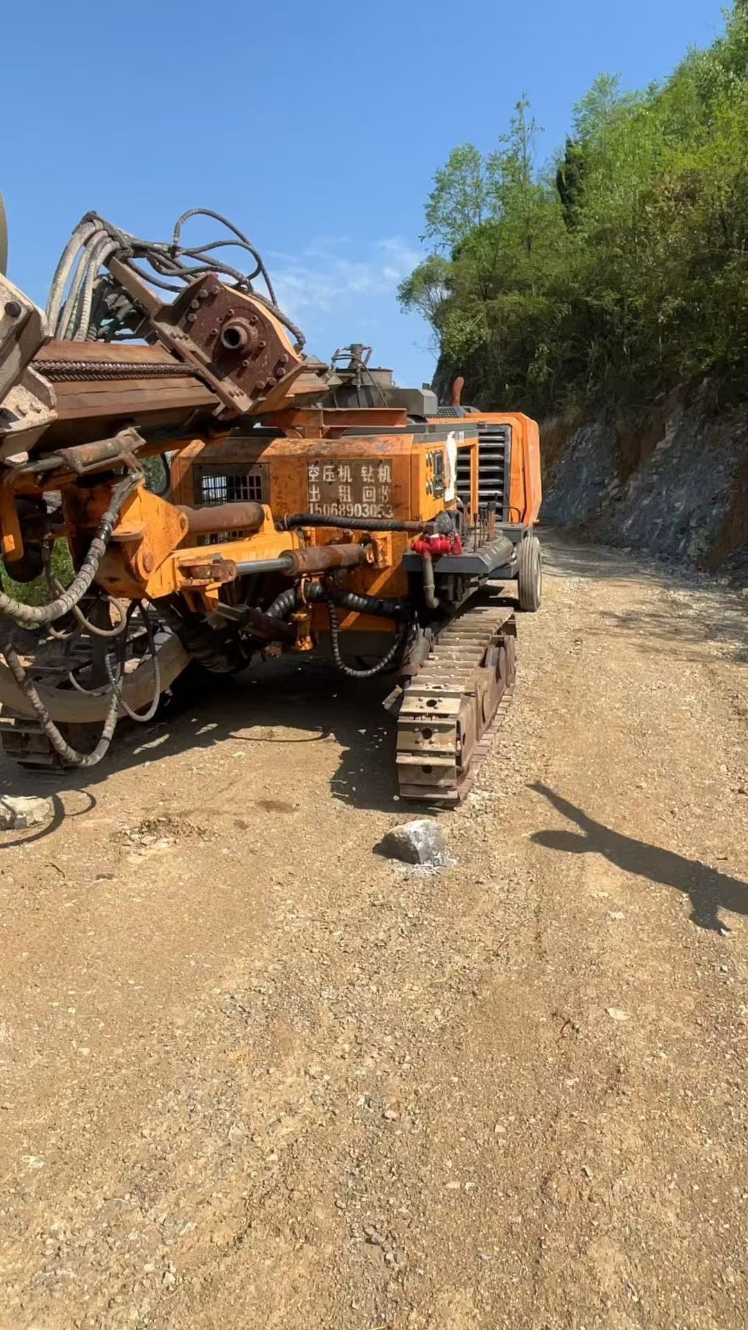 Various air compressors and down-the-hole drills for sale.