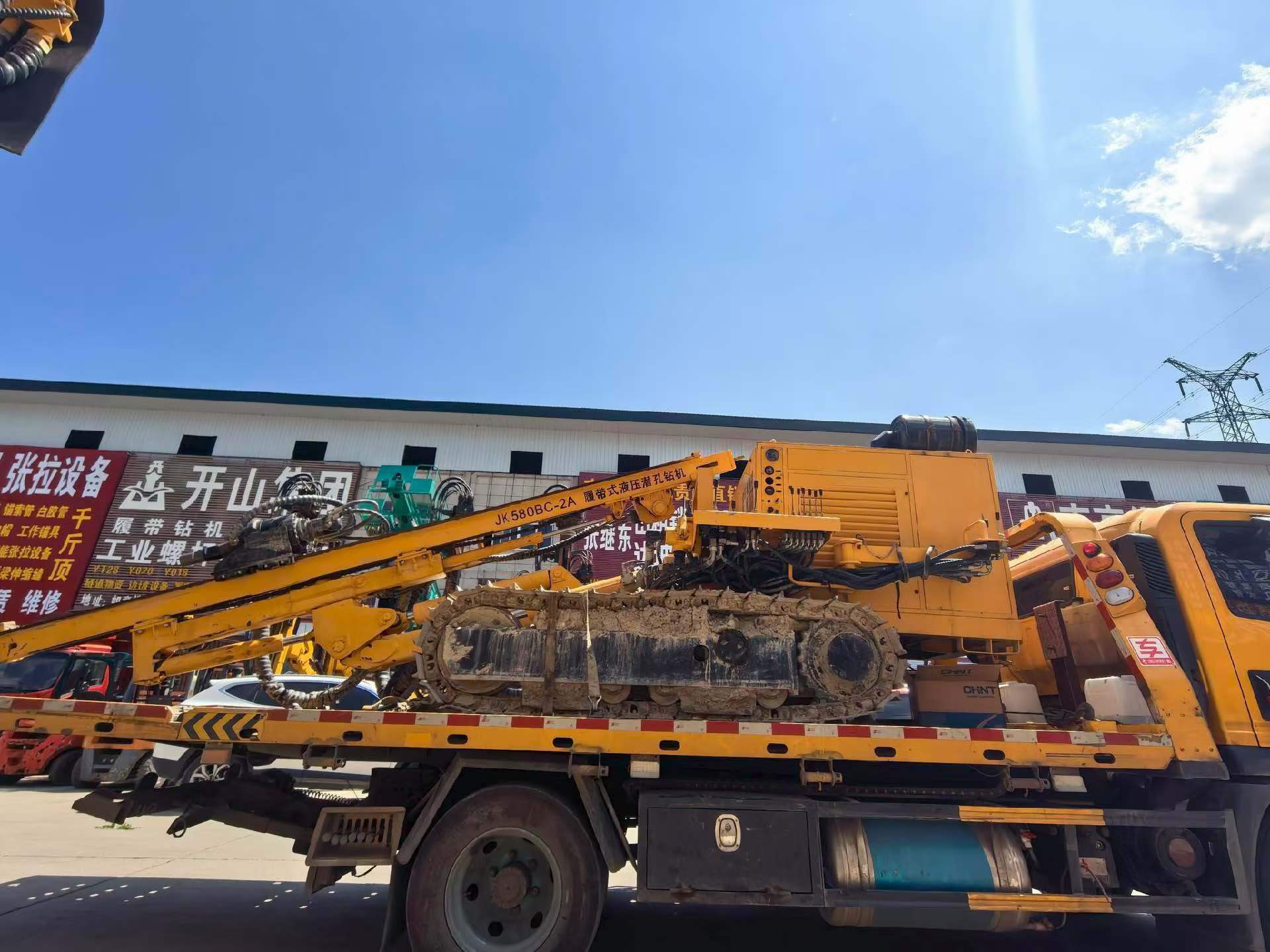 Various DTH drills and air compressors for sale.